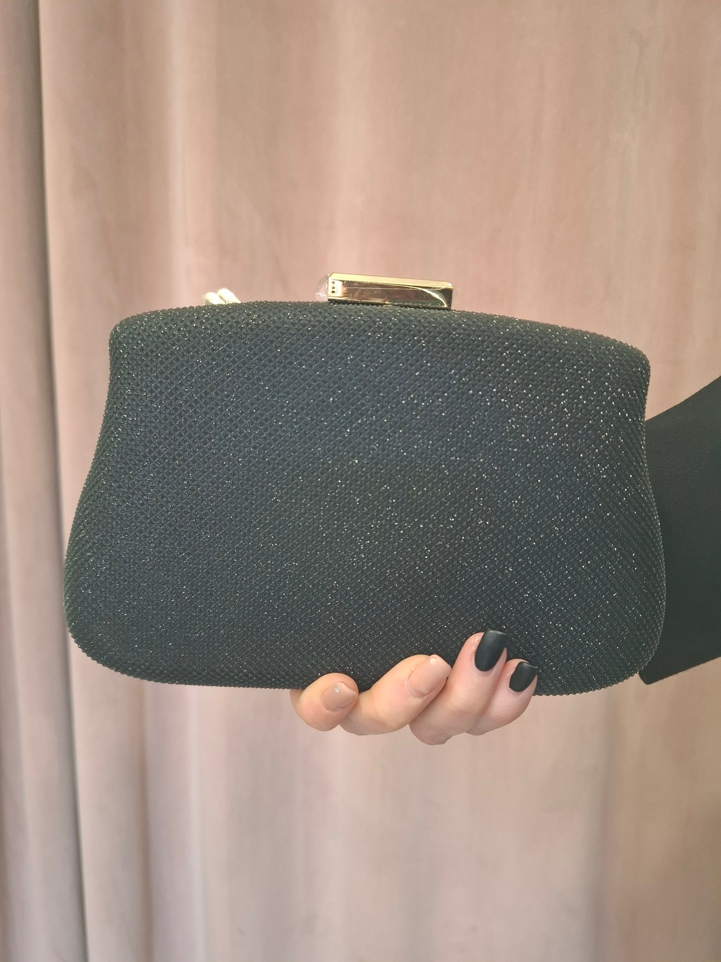 Clutch scintillante con tracolla